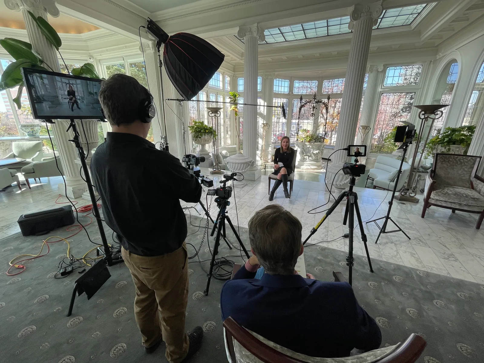 Behind-the-scenes production setup with Summit cameras, lighting, and crew on site