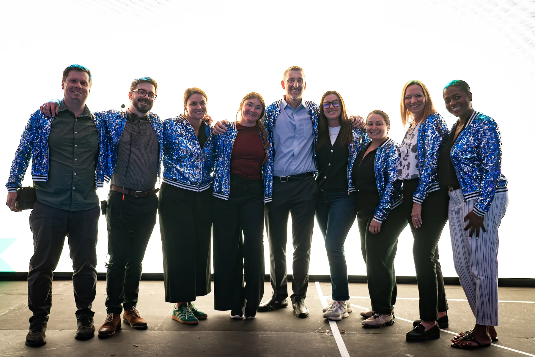 Imprint Group event team posing together at a corporate event