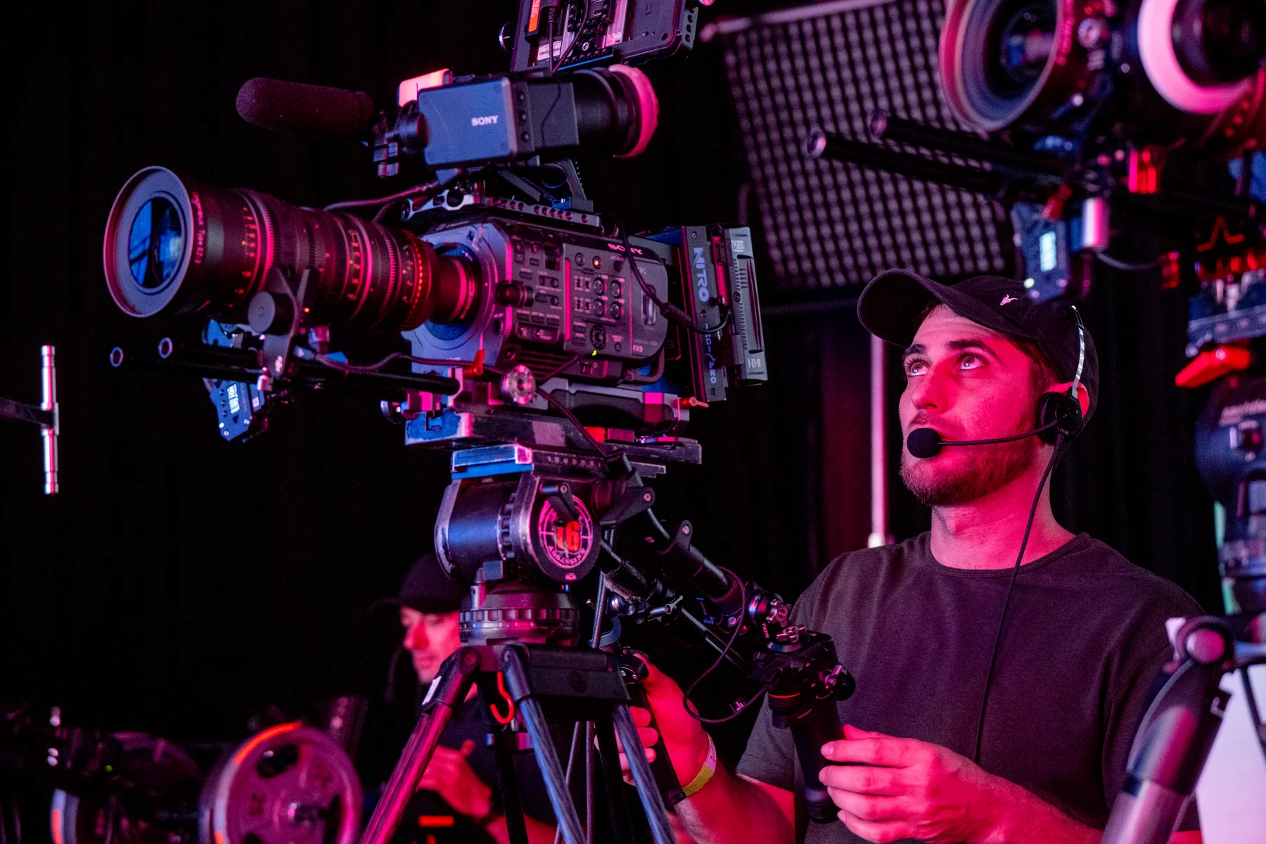 Zoomtopia camera operator with cinema camera during rehearsal